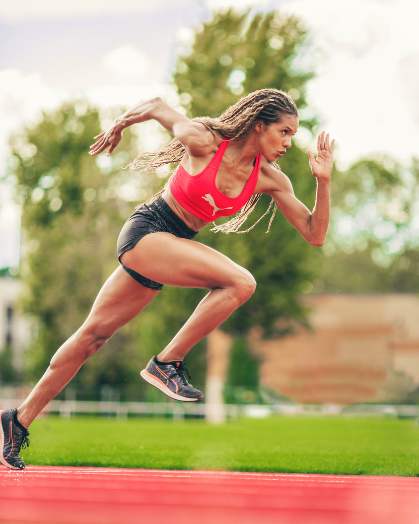 Woman in Red Sports Bra Running